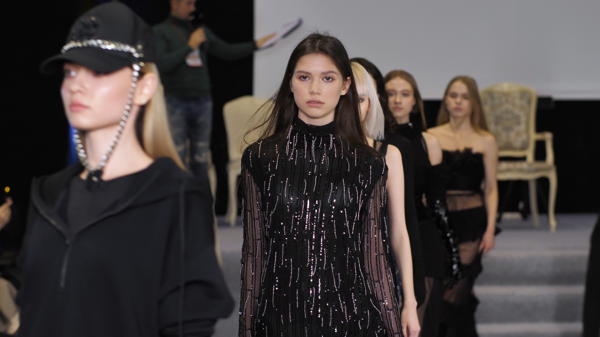 Model people moving in line on classy fashion week stage show. Female catwalk.